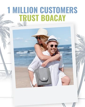 couple walking in the beach with woman carrying medium toiletry bag